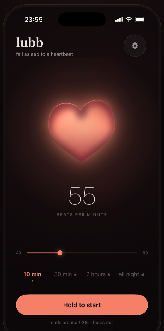 Lubb's main screen on an iPhone: a glowing ember heart, 55 beats per minute, the free ten-minute session selected, and a Hold to start button.